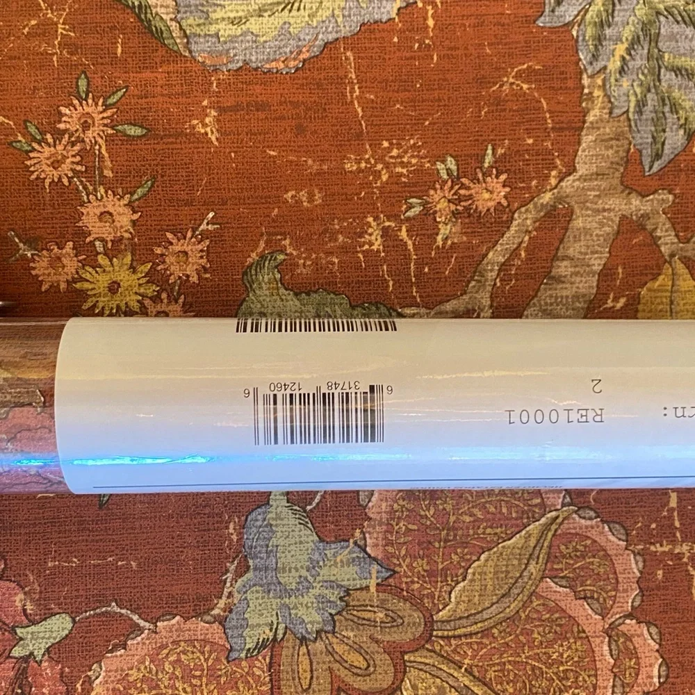 Wallquest wallpaper double roll. Floral Patterned in Warm Tones. New in pack